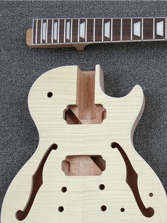 An unfinished set neck body and neck