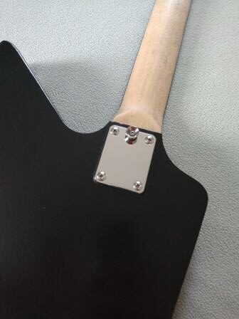 Modified strap pin location for a bolt-on neck