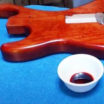 Guitar body with red dye