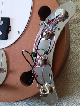 Passive control plate modified for Music Man style pickup in "spin-a-split" configuration